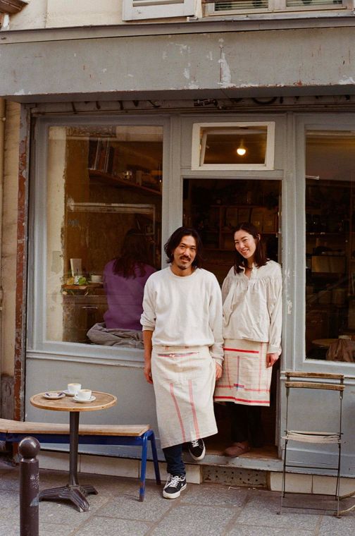Café owners outside their shop
